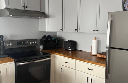 Westerly Apartamento | A pie de todo el centro, con acceso a la playa.