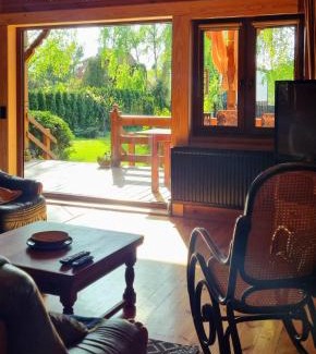 Januszkowo Casa | Drewniany dom z kominkiem, trasą S7 w 2h z Warszawy i Gdanska nad jezioro Mielno