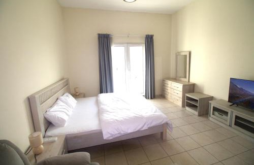 Discovery Gardens Apartamento | DRUVYA HOLIDAY HOMES, Bld DG079, Street No,3 Discovery Gardens, Close to The Gardens Metro 3 minutes walkable