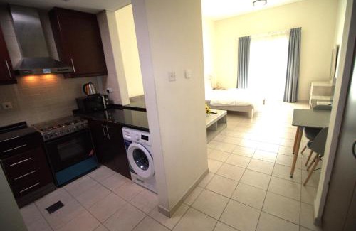 Discovery Gardens Apartamento | DRUVYA HOLIDAY HOMES, Bld DG079, Street No,3 Discovery Gardens, Close to The Gardens Metro 3 minutes walkable