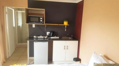 Greater Johannesburg Metropolitan Area Apartamento | Dumelang Executive Lodge- Cottages in Sandton