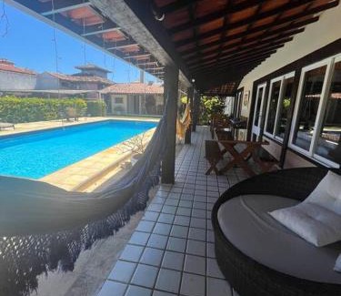 Manguinhos Casa | Duplex Geriba 250m da praia, rede futevôlei, sauna