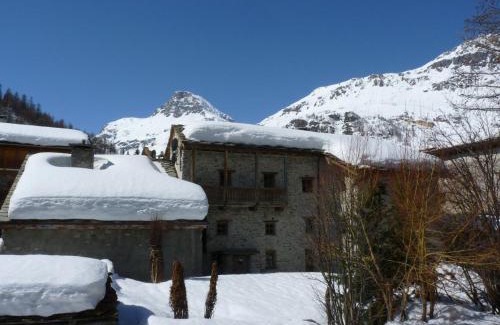 Val-d'Isere Apartamento | Duplex rustique avec grande terrasse au Sud, proche vieux Val-d'Isère - FR-1-694-310