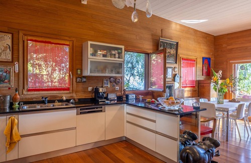 Valle-de-Campoloro Casa | E Tre Petre wooden house with magnificent sea views and a large garden planted with trees