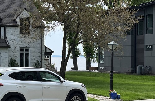 Oshkosh Casa | EAA rental near airport w/firepit, backyard, peekaboo lake view, and a clear sky