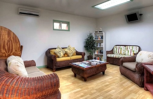 Worthing Hotel | Easy Beach Access from Your Cozy and Well-Maintained Room | 2 Units w/ Balcony