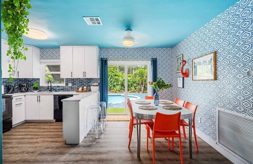 Garden Isles Casa | Eccentric home with pool, tiki hut & outdoor kitchen