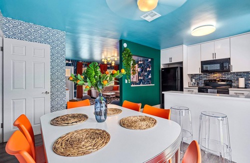 Garden Isles Casa | Eccentric home with pool, tiki hut & outdoor kitchen
