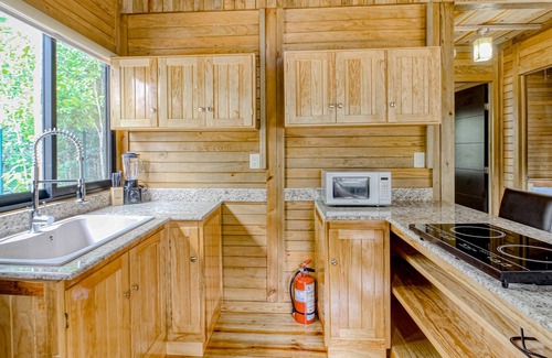Tulum Cabina | Eco-luxe jungle cabin with furnished patio, lanai, partial AC, & on-site cafe