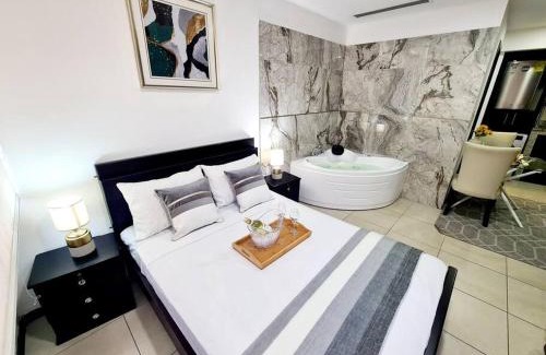 Puerto Santa Ana Apartamento | Ecusuites Habitación VIP con Jacuzzi Hidro