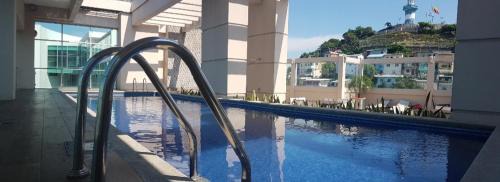 Puerto Santa Ana Apartamento | Ecusuites Riverfront l Balcony
