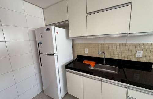 Praia do Morro Apartamento | Ed Veneto/2 bedroom apartment with suite and sea view