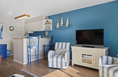 Charlevoix Condominio | Edgewater Inn Condo #117D with Waterfront Access | Pool, Hot Tub, Sauna