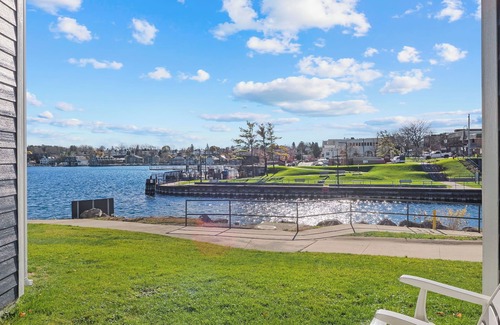 Charlevoix Condominio | Edgewater Inn Condo #117D with Waterfront Access | Pool, Hot Tub, Sauna