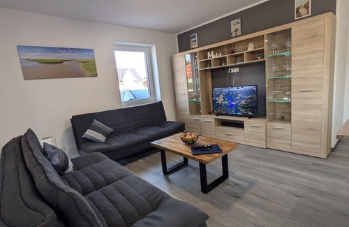 Schweiburg Apartamento | Eingerichtete Neubauwohnung in Schweiburg mit Nähe zum Jaderpark und Nordsee