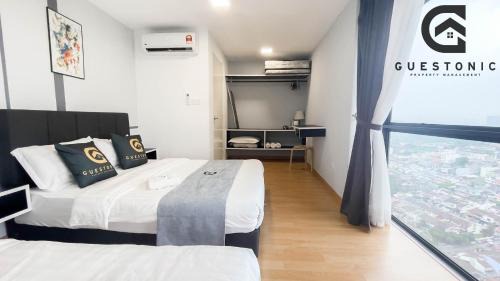 Taman Mutiara Cama Y Desayuno | EkoCheras Cozy Suite by GUESTONIC