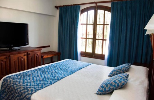 Merlo Hotel | El Cortijo Apart - Hotel