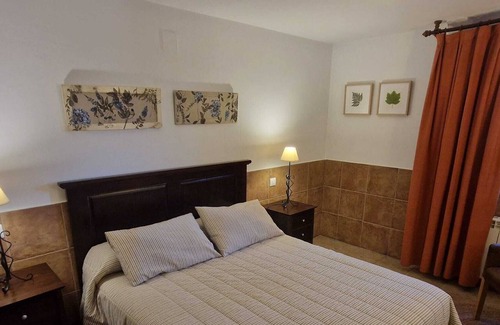 Una Cabaña | Casa el Escalerón 4 | Patio con vistas, chimenea y barbacoa