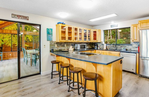Eldon Casa | Eldon House waterfront home with firepit, full kitchen, hot tub, & washer/dryer