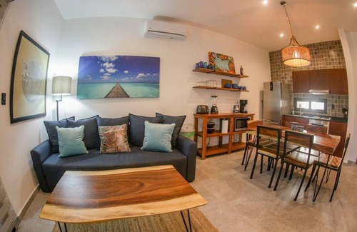 Mario Villanueva Madrid Condominio | Elegant 2-Bedroom 2-Bath Retreat with Rooftop Oasis & Pool