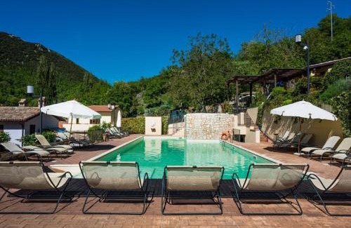 Foligno Casa | Elegant apartment in resort with swimming pool featuring nature and tranquillity