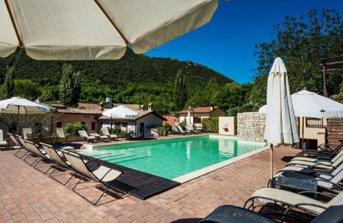 Foligno Casa | Elegant apartment in resort with swimming pool featuring nature and tranquillity