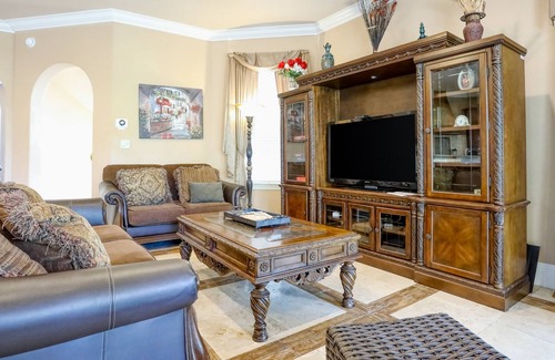 St. Tropez Casa | Elegant coastal villa with spacious patio, pool, hot tub, free WiFi & central AC