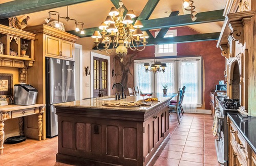 Franklin Springs Otro | Elegant home with two living areas, a furnished patio, & wood fireplace