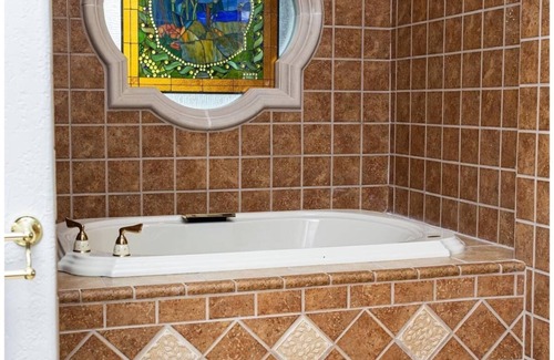 Greenville Otro | Elegant, romantic castle w/ rooftop deck, forest, pond and theater!
