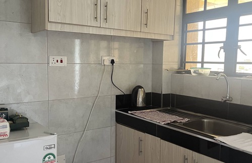 Juja Apartamento | Elegant studio with WiFi ,Lift and fitness room in Juja town