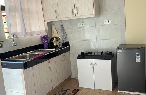 Juja Apartamento | Elegant studio with WiFi ,Lift and fitness room in Juja town