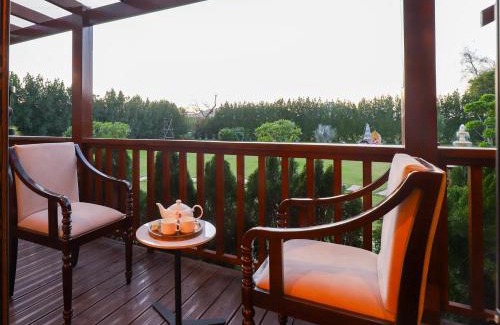 Dubbi Villa | ELIVAAS Riveira Hills - 3 BHK Wooden Cottage with Lush Garden, Pvt Pool