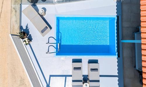Vathi Villa | Elyver Villa Heated Pool