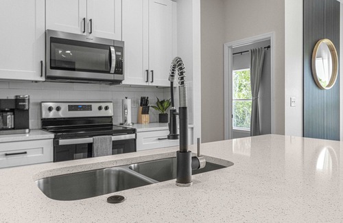 Ocala Casa | Ember's Place. Charming 4-bedroom w/ Hammock & Arcade games, in enchanting Ocala