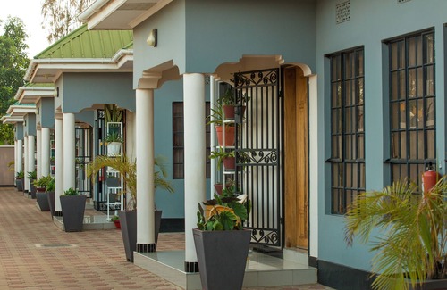 Arusha Apartamento | "Embrace Arusha's charm at Medan Hotel & Apartment: Your Ideal Stay!"