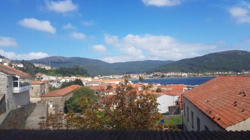 Muros Apartamento | En Muros, céntrico, amplio, luminoso, vistas al mar