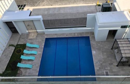 Las Gaviotas Apartamento | En Zona dorada con alberca y terraza con vista y asador - GG Palmeras