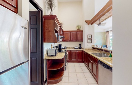 Esterillos Este Condominio | Enchanting & tropical escape with pool, spacious balcony, W/D, & amazing views