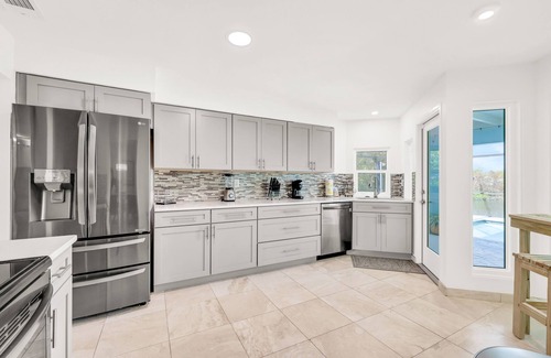 Fort Myers Casa | Enchanting waterfront home with pool, dock, washer/dryer, & dog-friendly