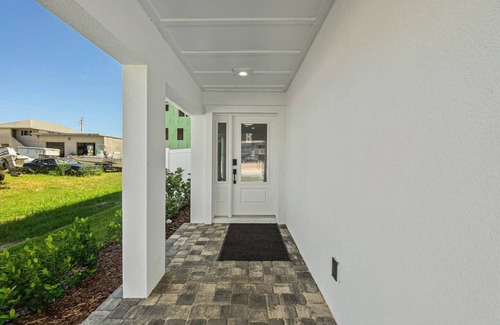 St. Augustine Beach Villa | Endless Summer Oasis heated pool and putting green