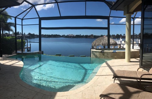 Eight Lakes Casa | Disfrute de hermosas puestas de sol en el lago Brittania con acceso al Golfo
