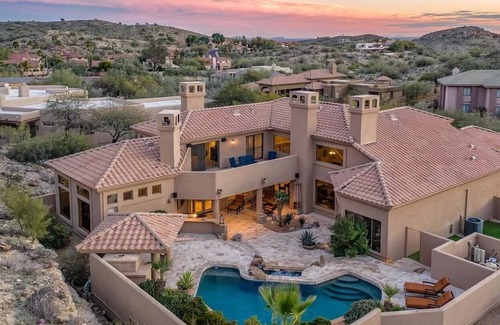 Mountain Park Ranch Casa | Enjoy breathtaking views of the mountainside throughout this hillside estate.