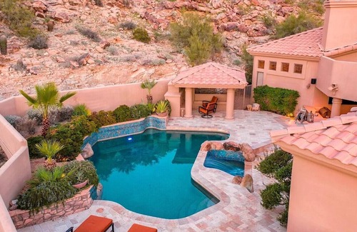 Mountain Park Ranch Casa | Enjoy breathtaking views of the mountainside throughout this hillside estate.