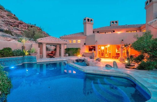 Mountain Park Ranch Casa | Enjoy breathtaking views of the mountainside throughout this hillside estate.