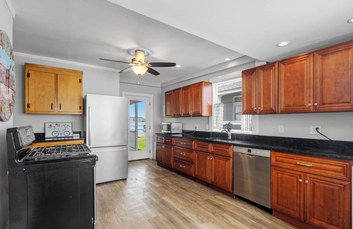 Waveland Casa | Enjoy Gorgeous Sunsets from Your Waterfront Beach Cottage