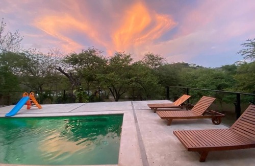 Santa Cruz Casa | Enjoy privacy and nature in this open concept home and relaxing pool.