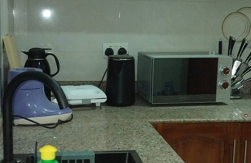 Dar es Salaam Casa | Enjoy spacious 3-bedroom apartment with WiFi, AC in charming Dar es Salaam City