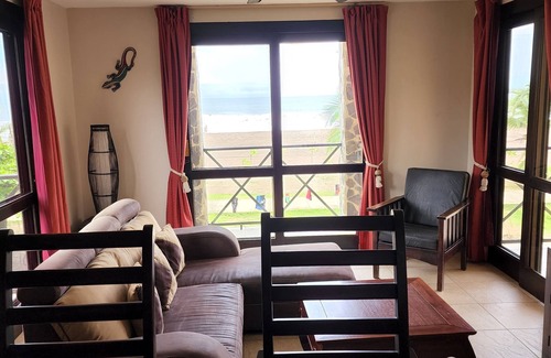 Barrio Los Villalobos Condominio | Enjoy the beach view while sitting on the lanai