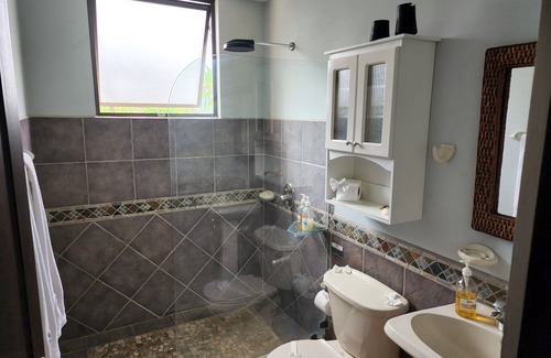Barrio Los Villalobos Condominio | Enjoy the beach view while sitting on the lanai