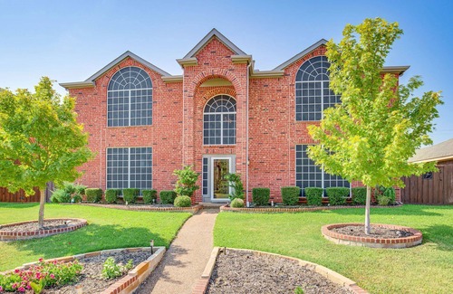 Rowlett Casa | Enjoy the peace and quiet back patio with Lagoon pool.